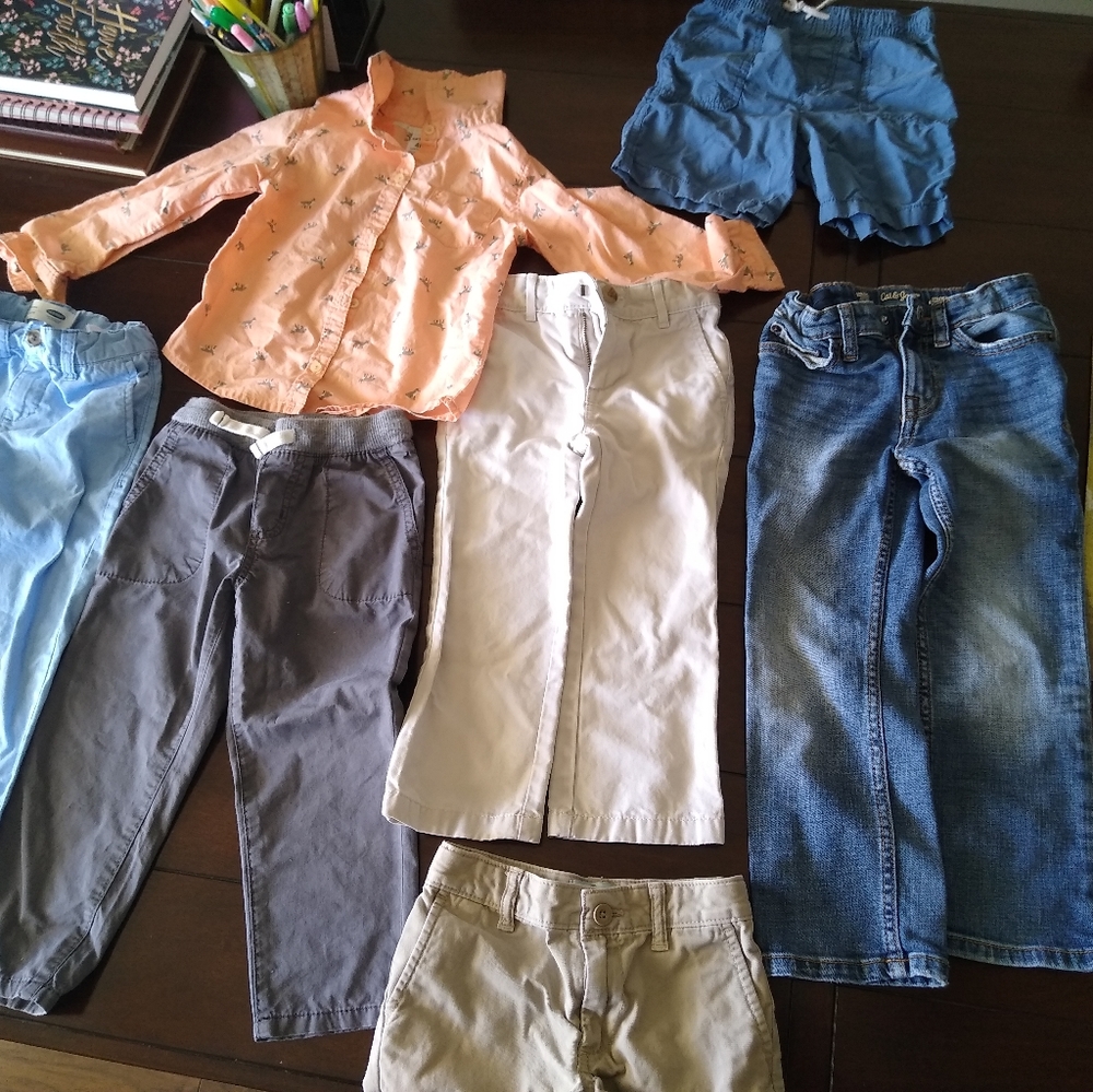 Bundle of 4 pants, 2 shorts 1 long sleeve shirt.